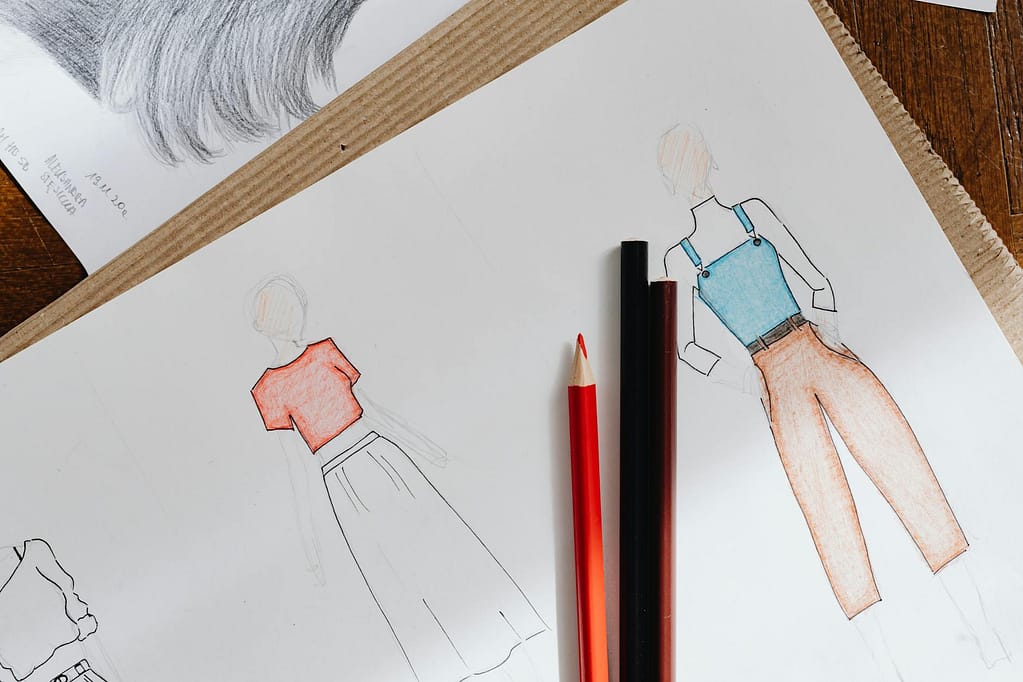 sketches of clothes on white paper- clothing design