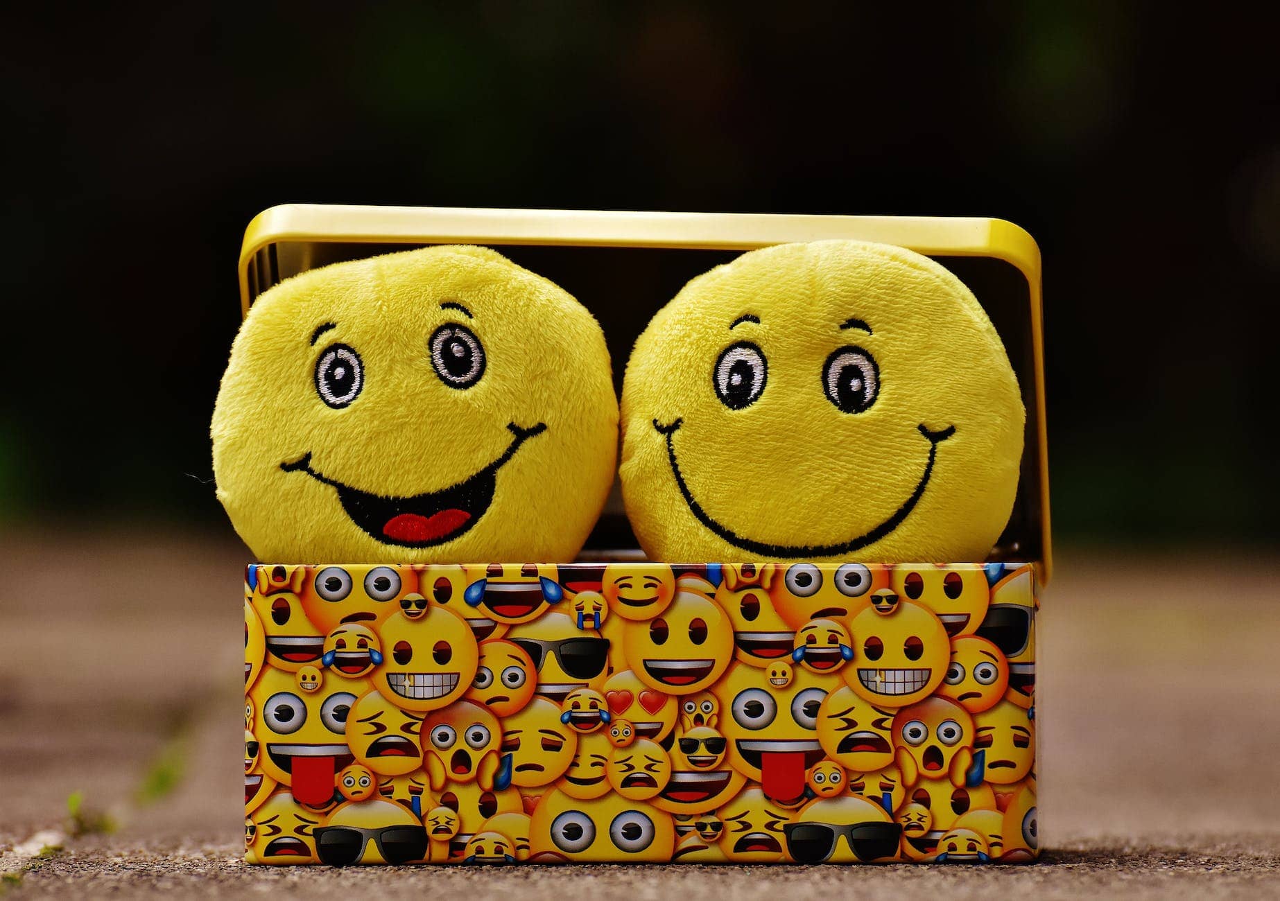 two yellow emoji on yellow case - boost your mood