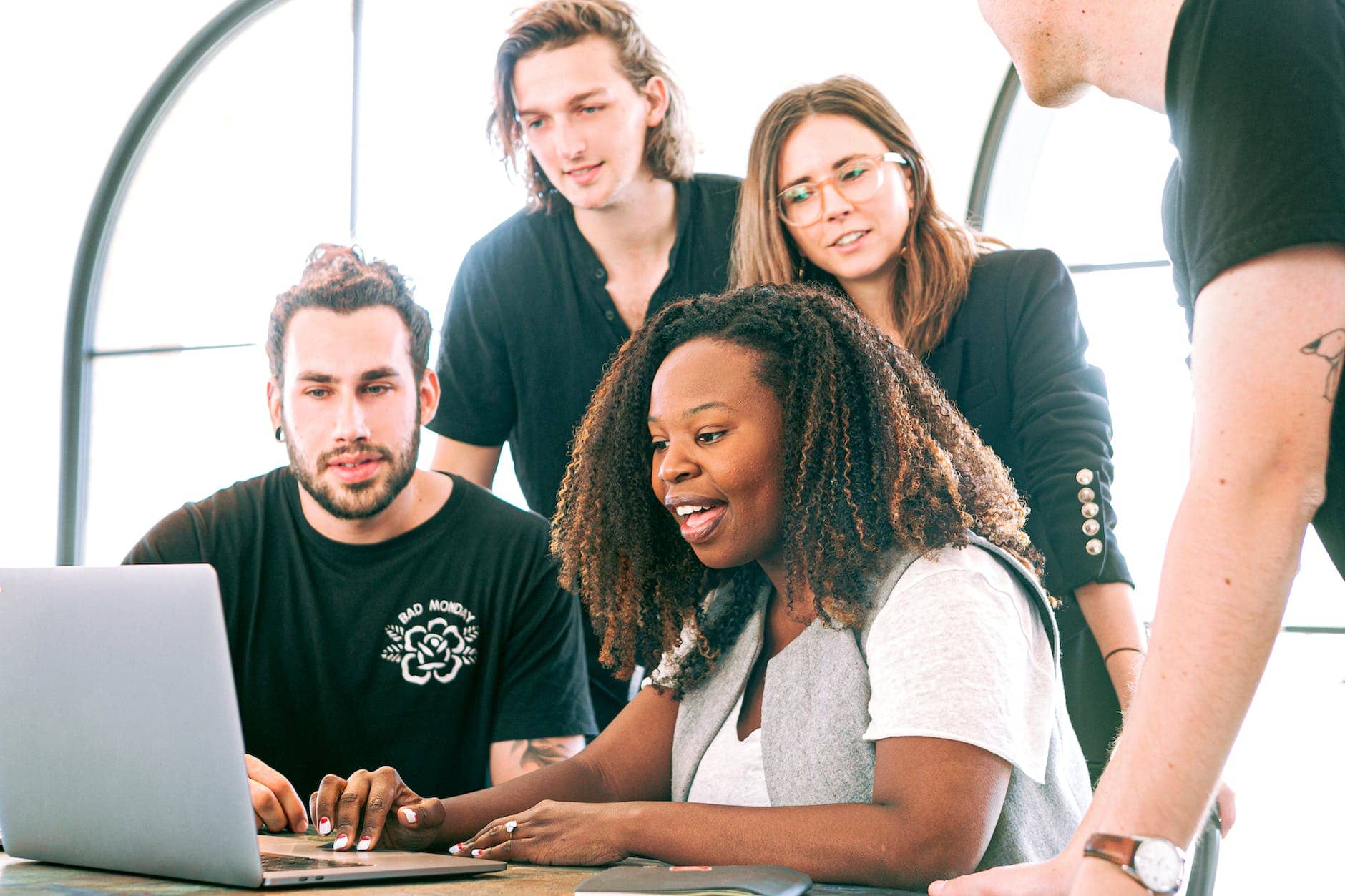 woman sharing her presentation with her colleagues - productive business owner