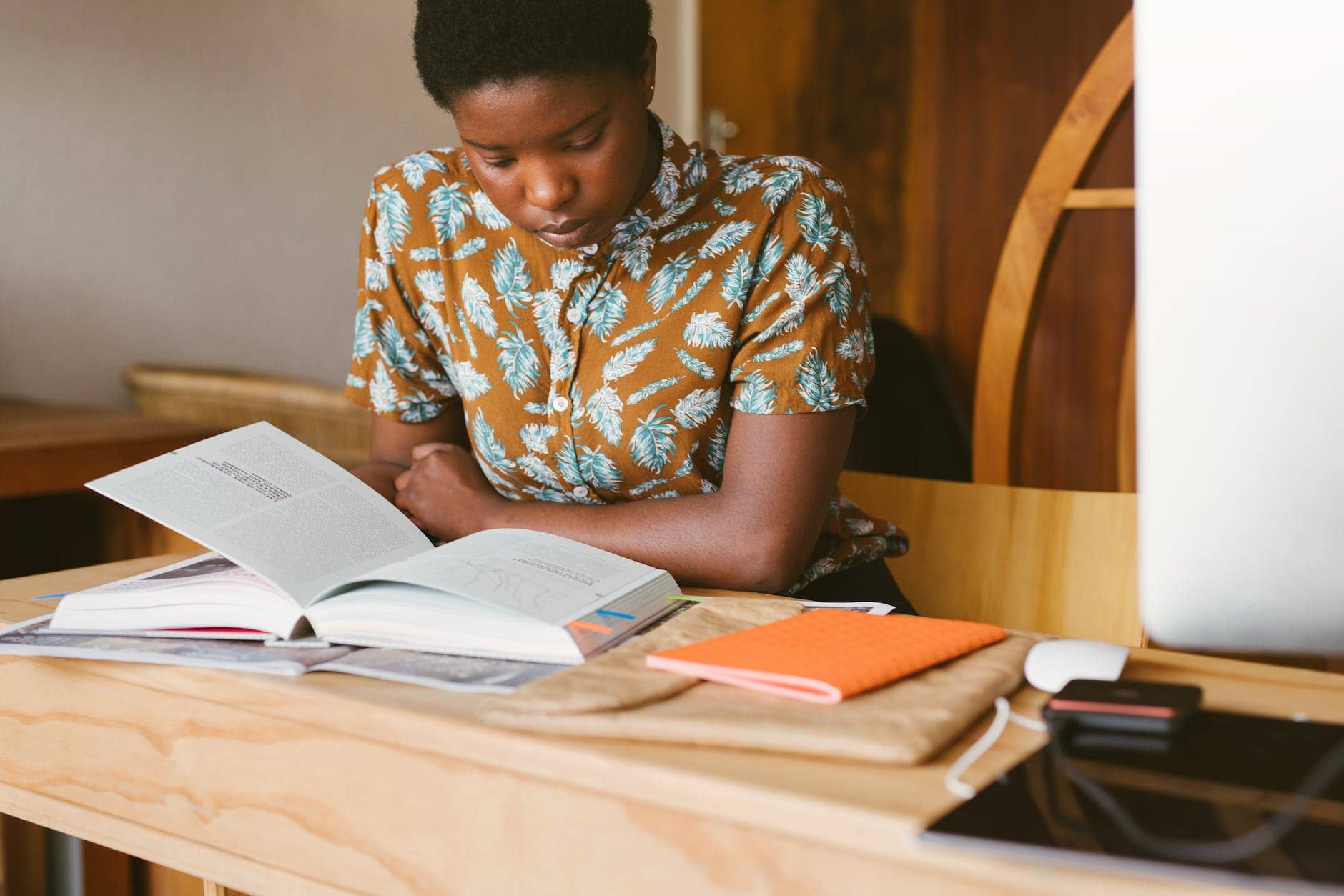 photo of woman reading books - how to be a better student