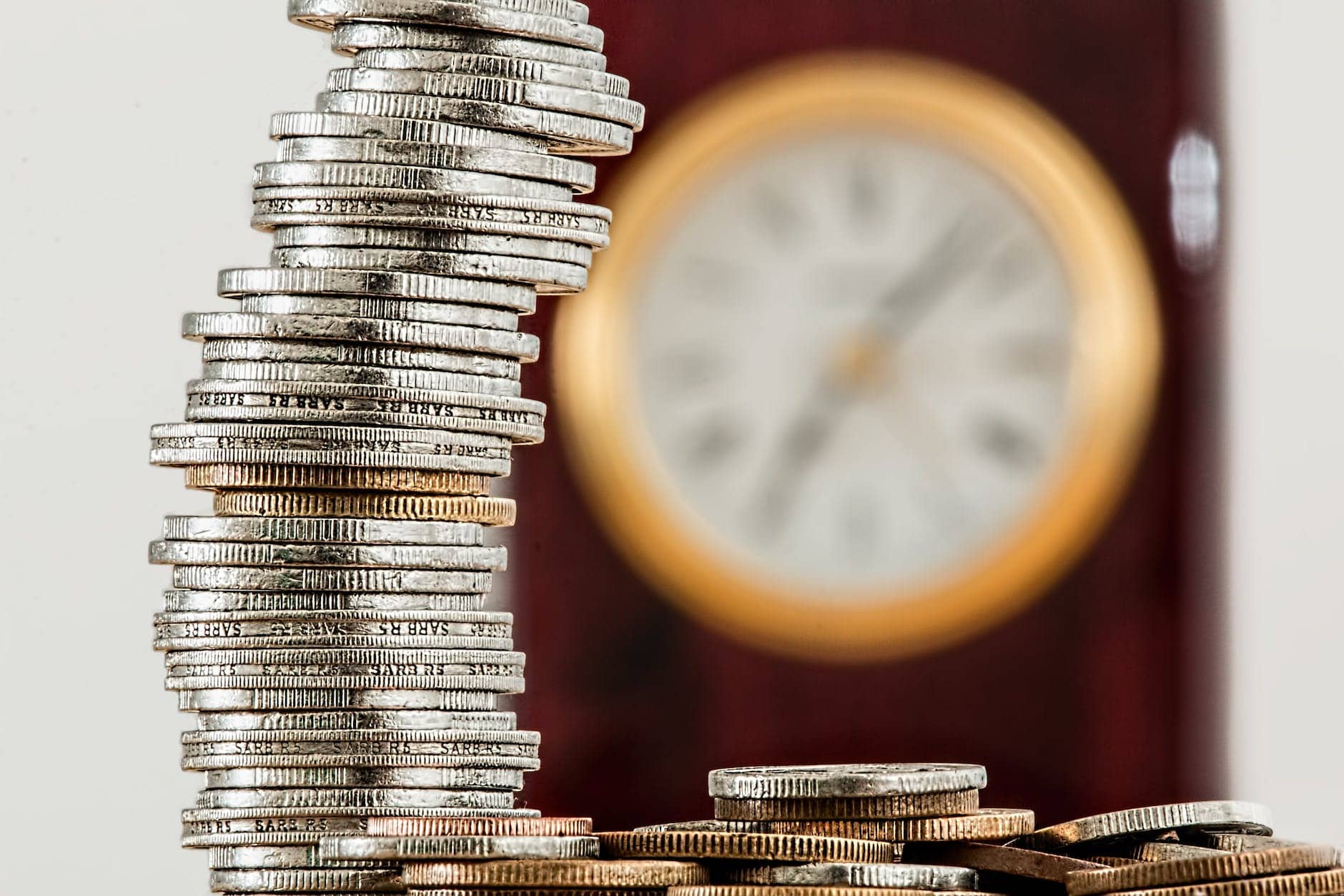 selective focus photo of stacked coins - Investment mistakes