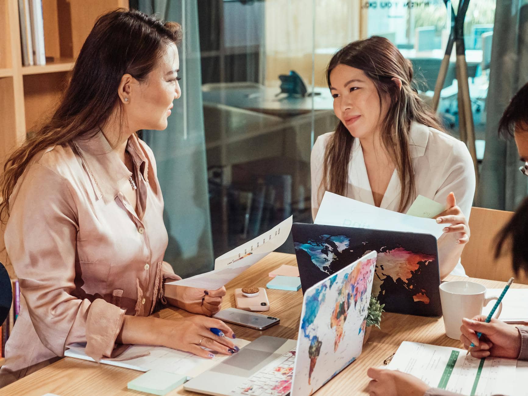 a group of people having a meeting in the office - starting a business