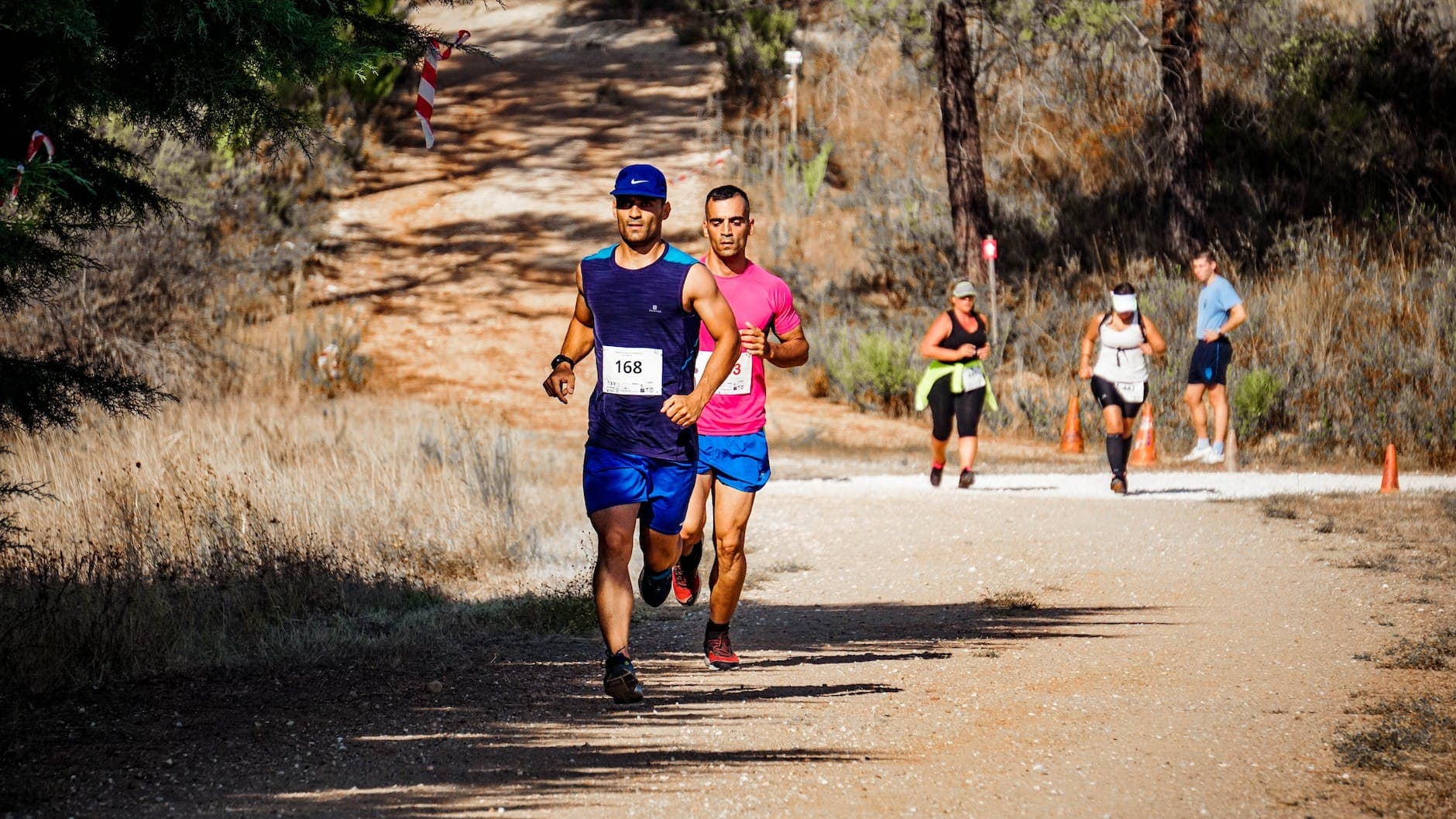 two man running on road - running injury prevention