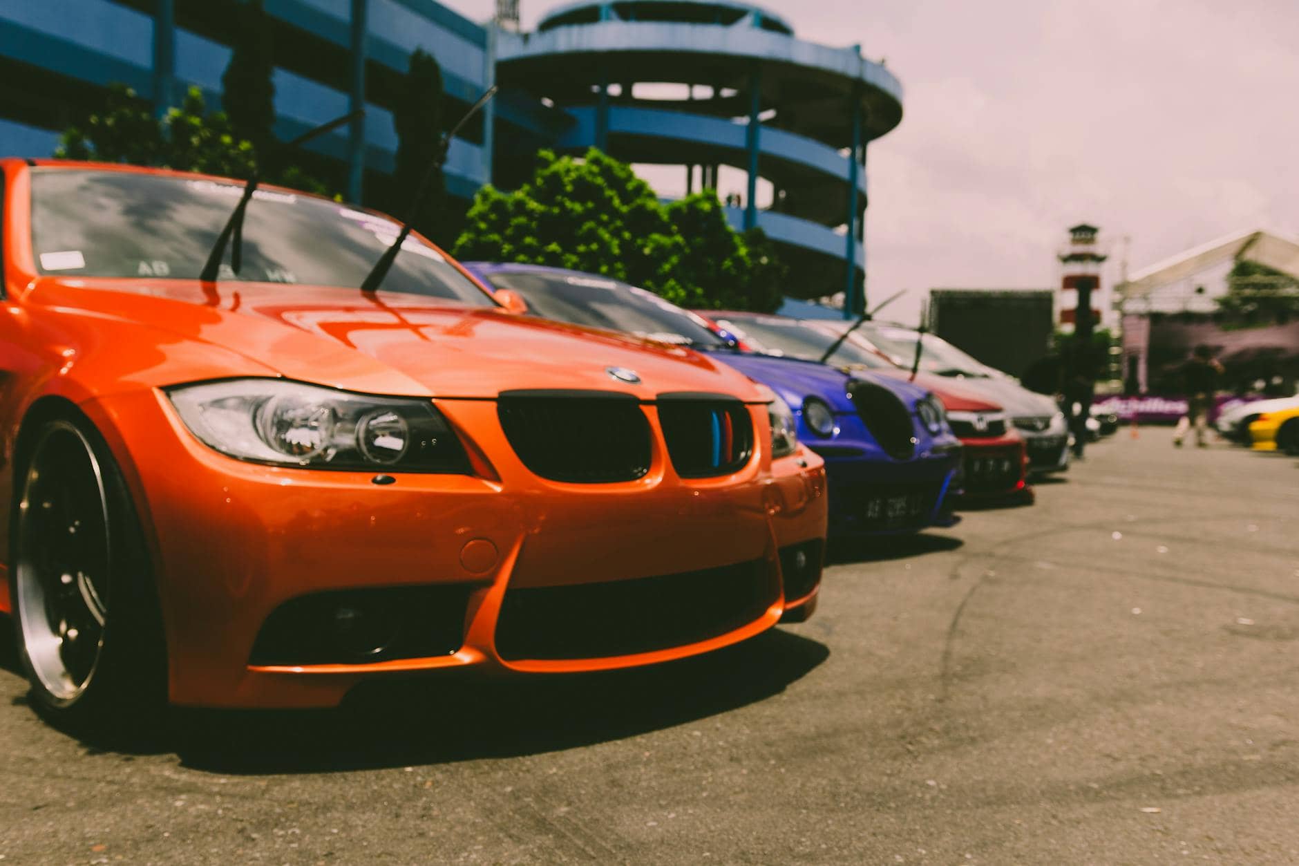 cars parked outside on concrete road - buy a work car