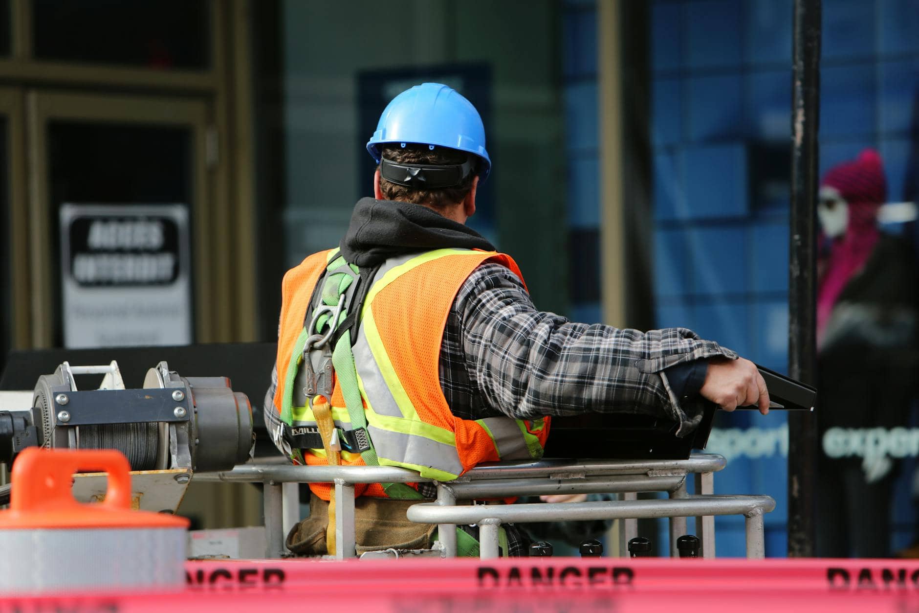 man wearing hard hat standing - workplace safety procedures