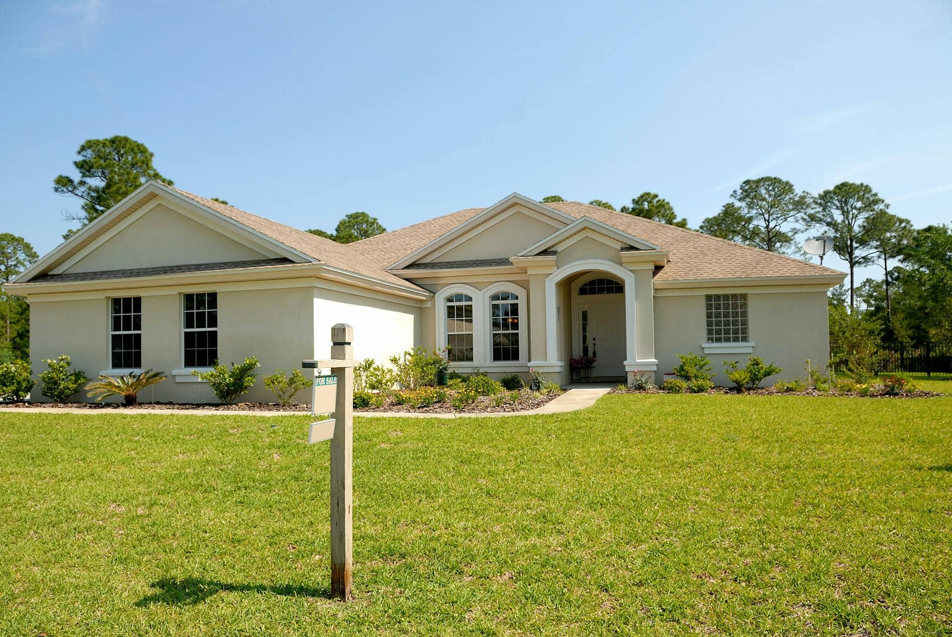 white and brown concrete bungalow under clear blue sky - Is Your Buyer Intentionally Delaying The Home Sale