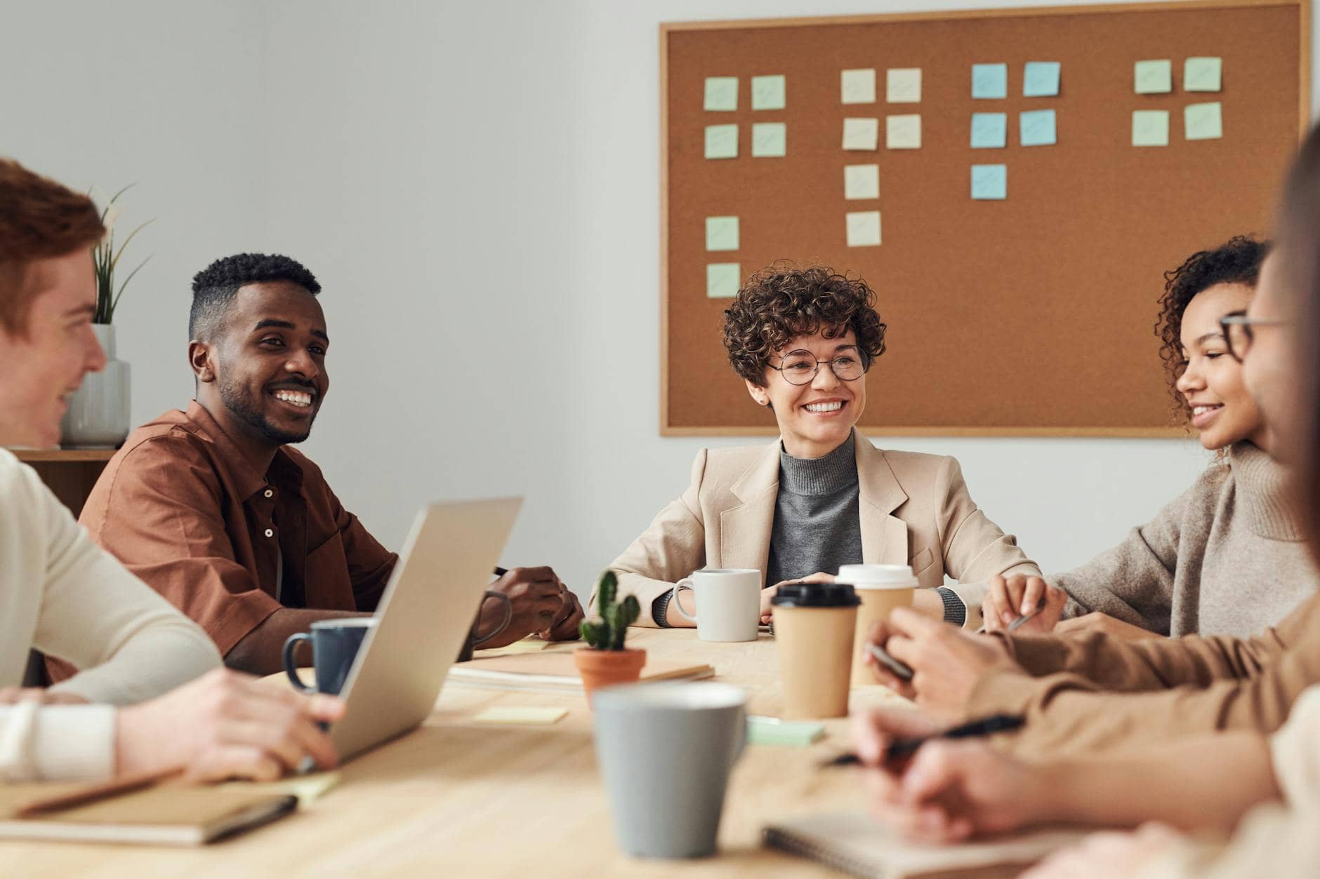 photo of people looking at each other - Improve Your Workforce's Productivity