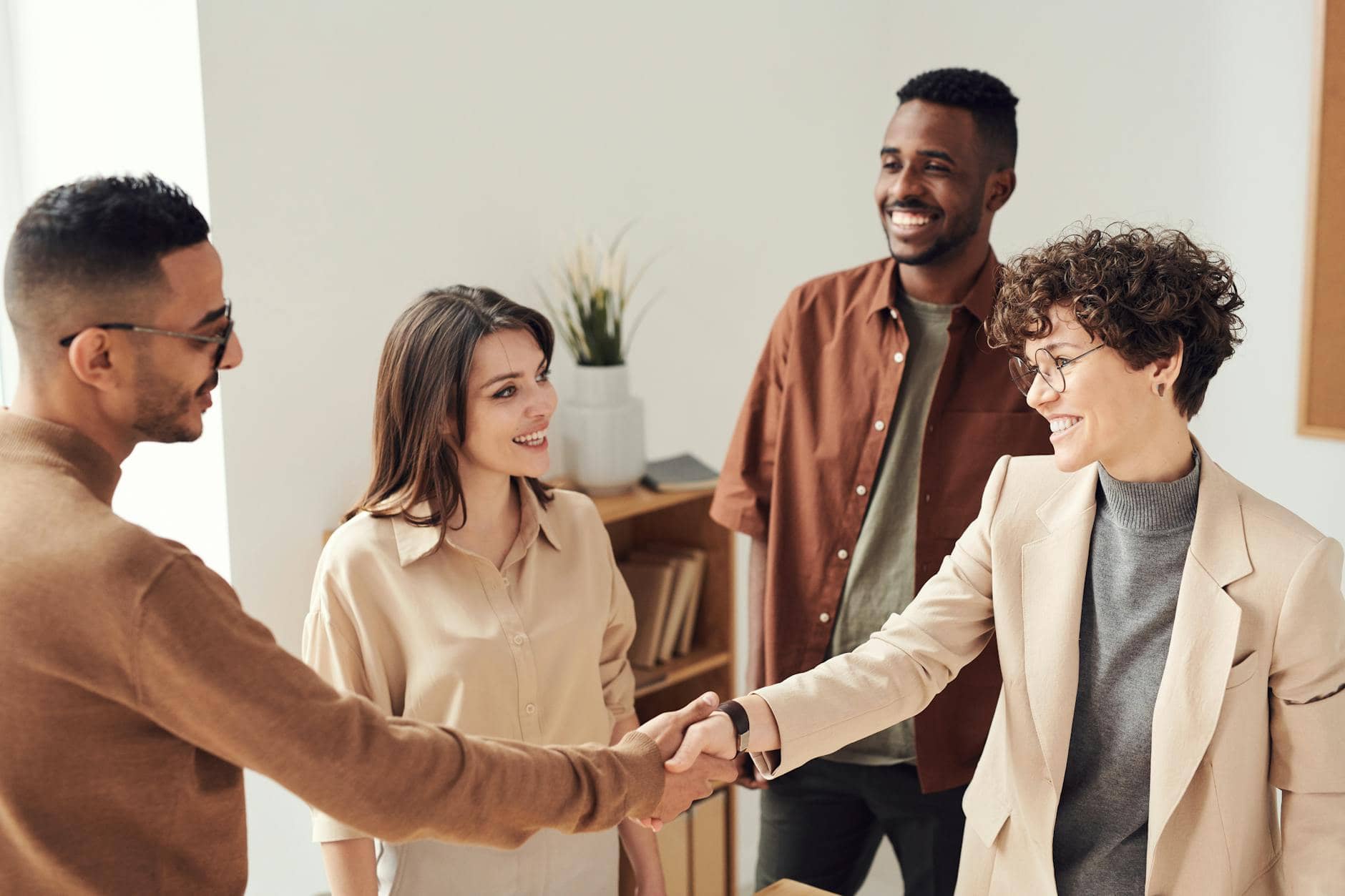 photo of people doing handshakes