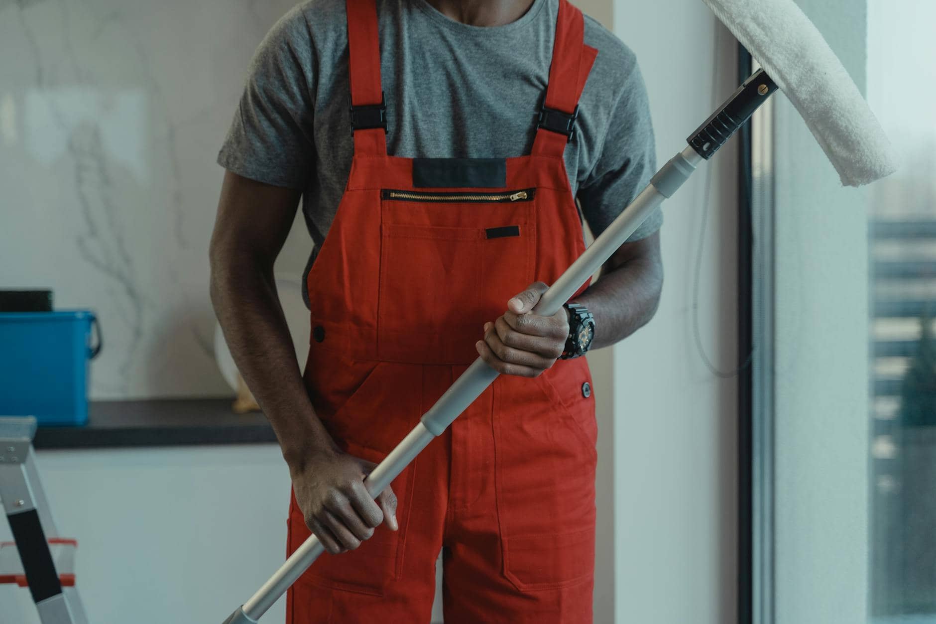 man wearing an orange coveralls