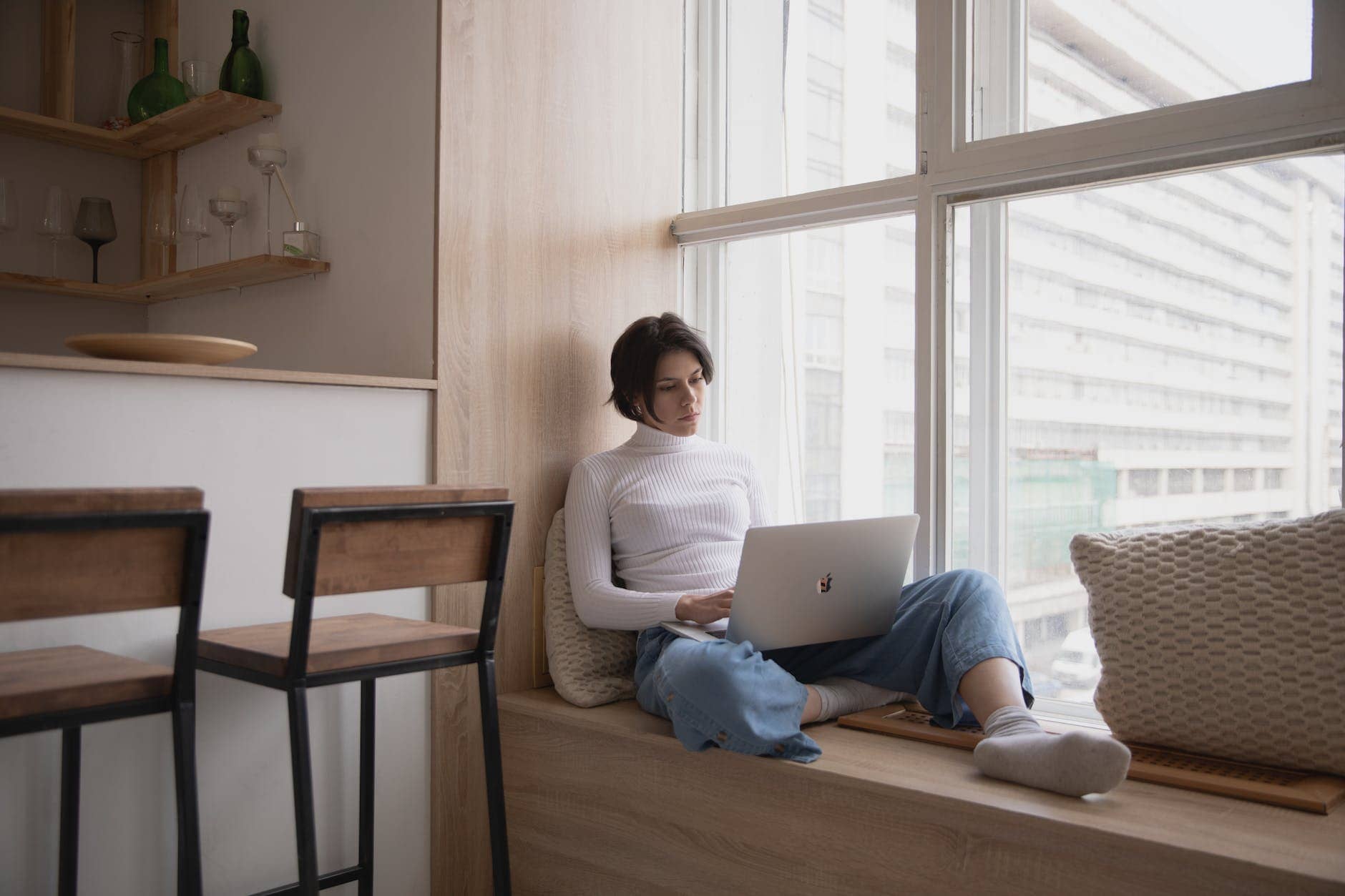 photo of woman using laptop - best jobs for people with social anxiety