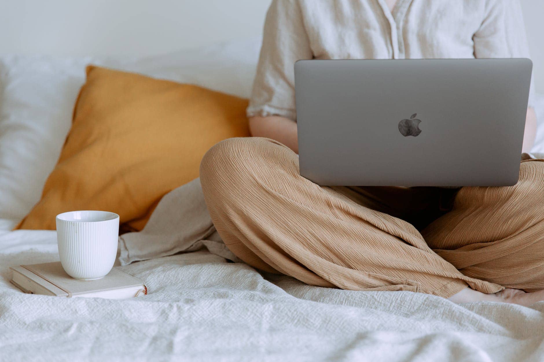 anonymous woman using laptop in bedroom -= online etiquette 